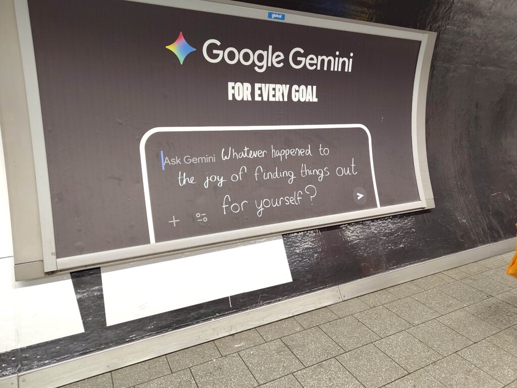 Shows an advertisement of Google Gemini reading "For Every Goal" with a handwritten note that functions as a critique to AI and this product reading "Whatever happened to finding things out for yourself?"